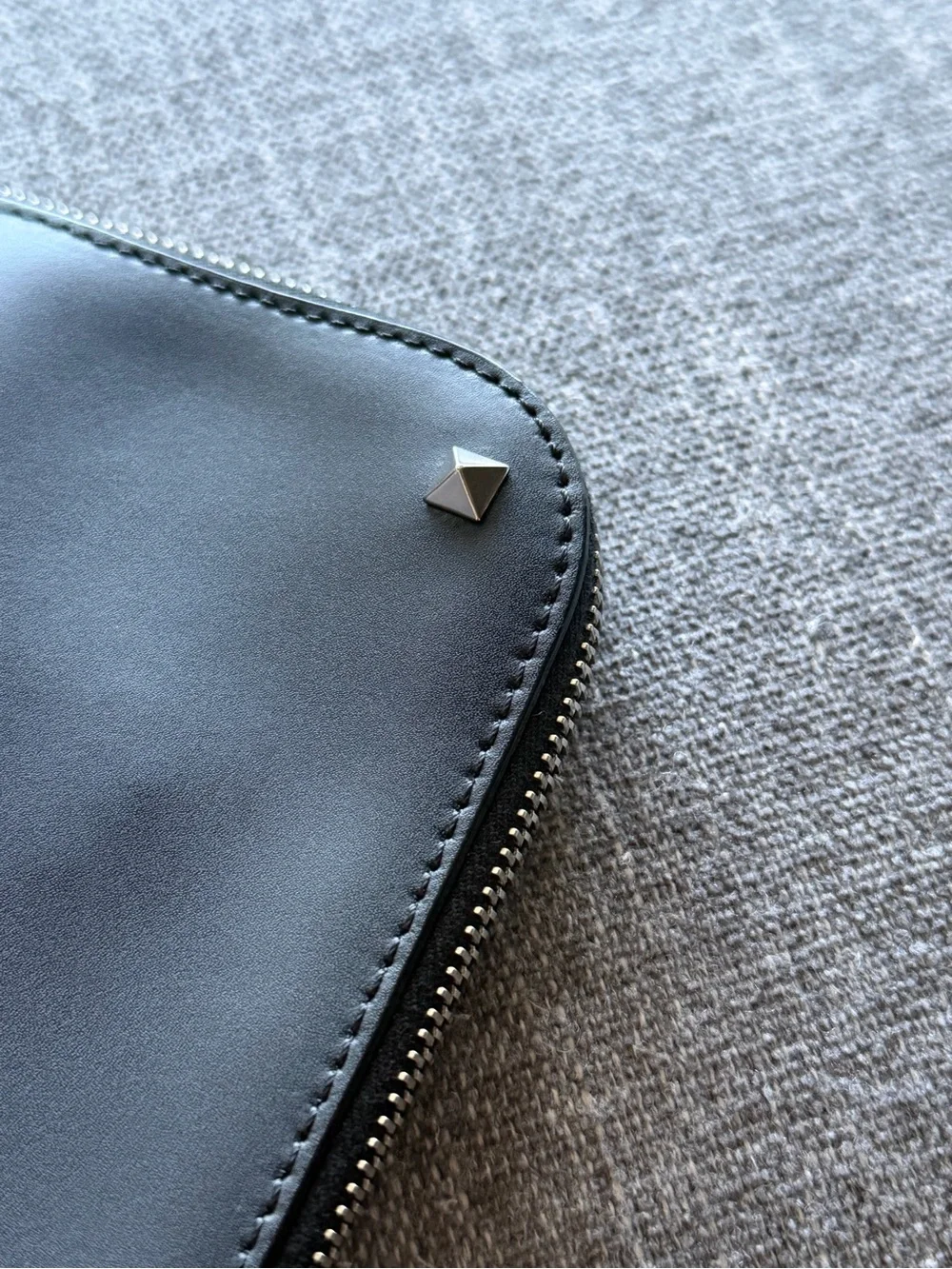 Valentino Garavani VLTN Black Leather Zip Pouch with Stud Accents